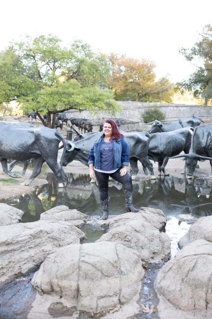 Heather McIlroy at Pioneer Plaza cattle drive